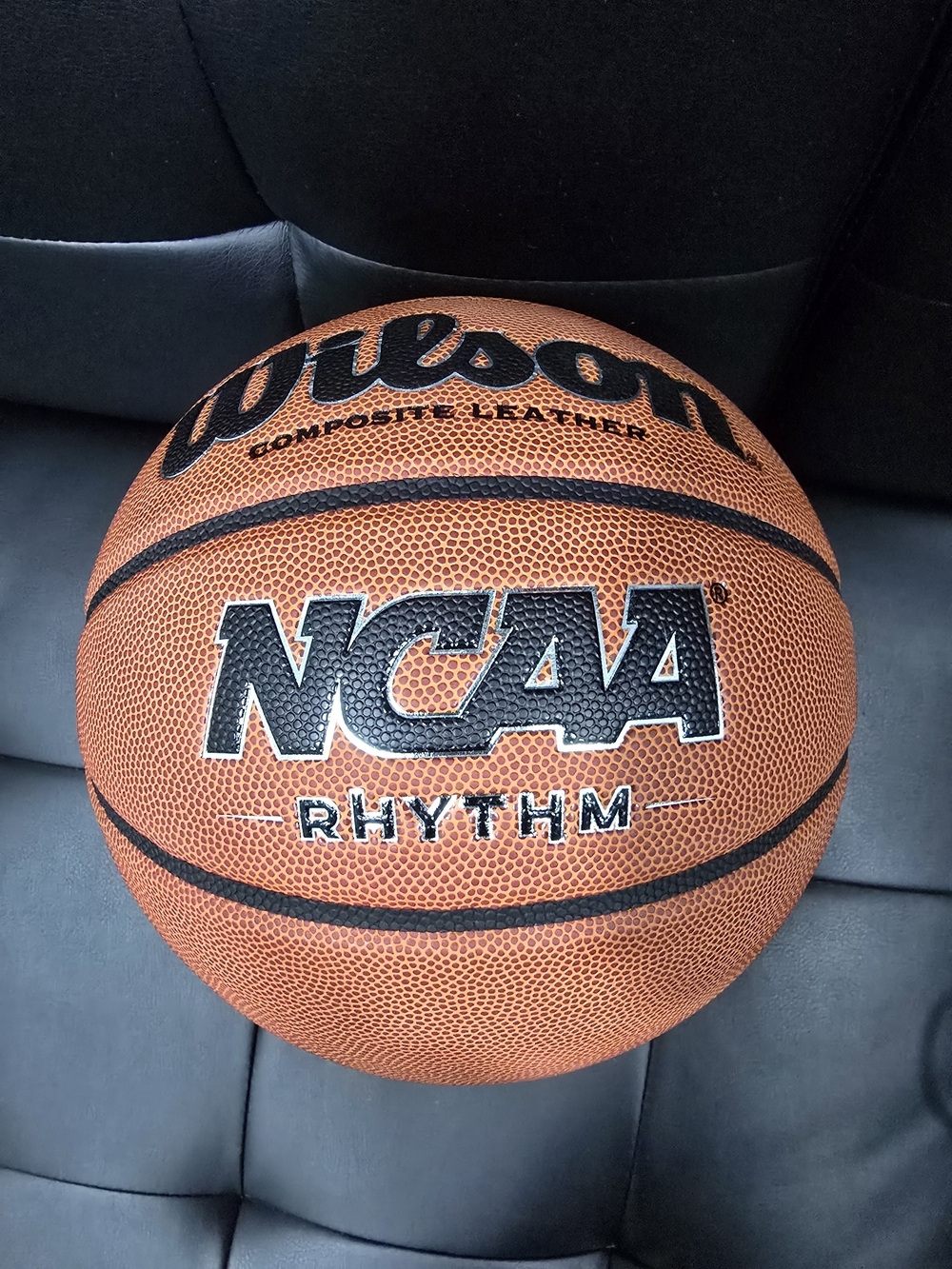Wilson NCAA Rhythm Basketball in Orange with Black Accents
